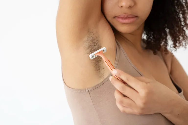close-up-view-woman-removing-armpit-hair